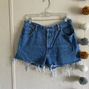 Frayed medium wash denim cutoff shorts